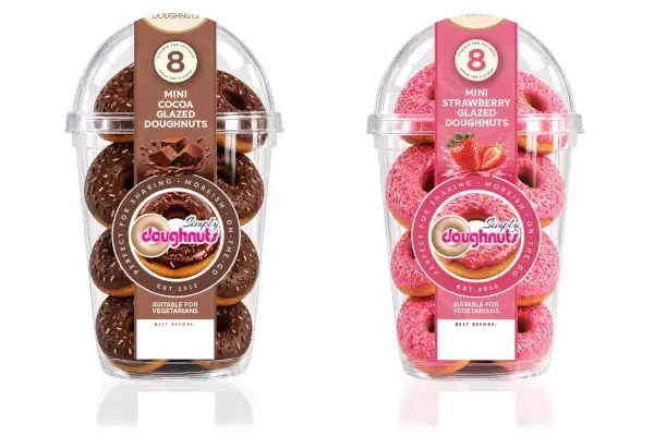 Tubs of Cocoa Glazed and Strawberry Glazed Mini Ring doughnuts side by side