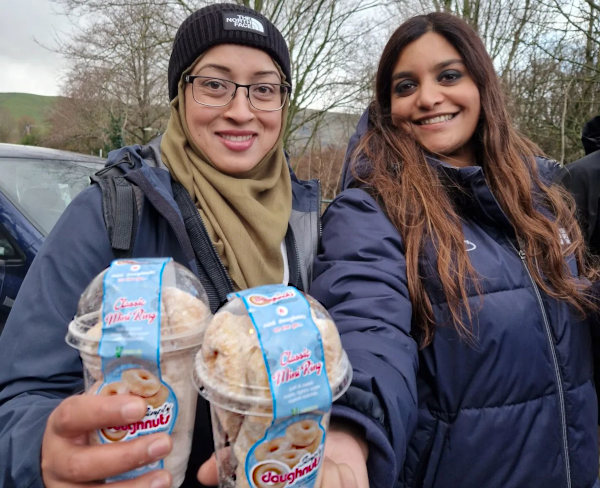 Hikers with their post-walk doughnuts