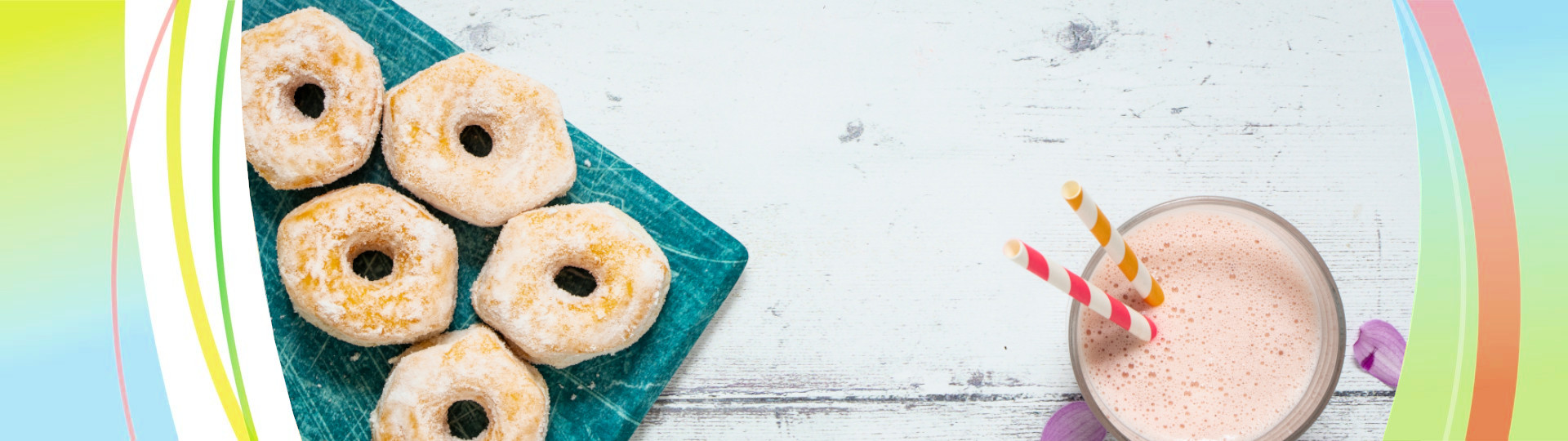 Classic Mini Ring Doughnuts on a board with milkshake