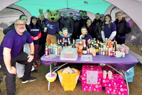 Keeping dry in the fundraising stall tent